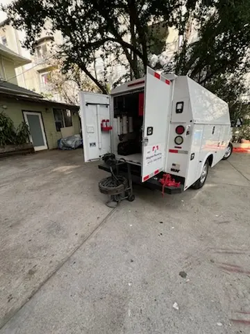 Magnet Plumbing service vehicle on-site for Water Heater Repair in Championsgate Village